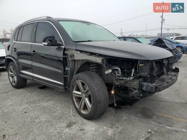 Черный Фольксваген Тигуан, объемом двигателя 1.98 л и пробегом 65 тыс. км за 650 $, фото 3 на Automoto.ua