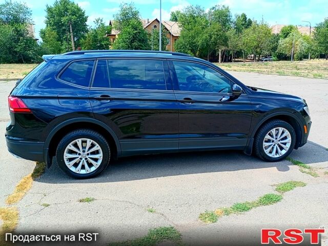 Чорний Фольксваген Тігуан, об'ємом двигуна 2 л та пробігом 93 тис. км за 15000 $, фото 6 на Automoto.ua