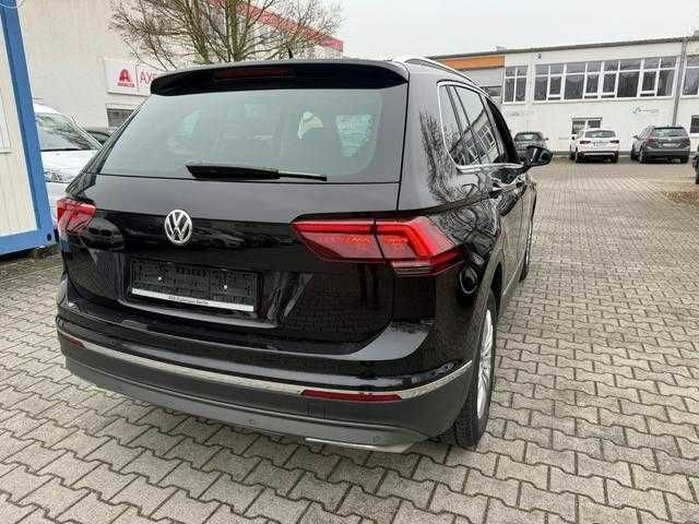 Черный Фольксваген Тигуан, объемом двигателя 2 л и пробегом 102 тыс. км за 12100 $, фото 3 на Automoto.ua