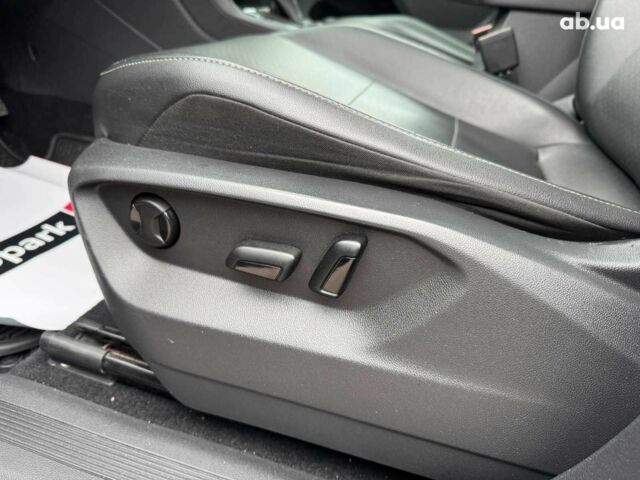 Черный Фольксваген Тигуан, объемом двигателя 2 л и пробегом 143 тыс. км за 18690 $, фото 21 на Automoto.ua