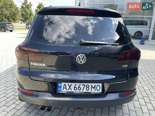 Черный Фольксваген Тигуан, объемом двигателя 1.98 л и пробегом 218 тыс. км за 12800 $, фото 14 на Automoto.ua