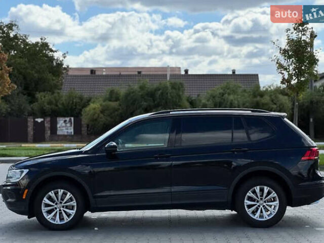 Чорний Фольксваген Тігуан, об'ємом двигуна 1.98 л та пробігом 155 тис. км за 13700 $, фото 2 на Automoto.ua