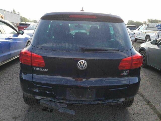 Черный Фольксваген Тигуан, объемом двигателя 2 л и пробегом 118 тыс. км за 2500 $, фото 5 на Automoto.ua