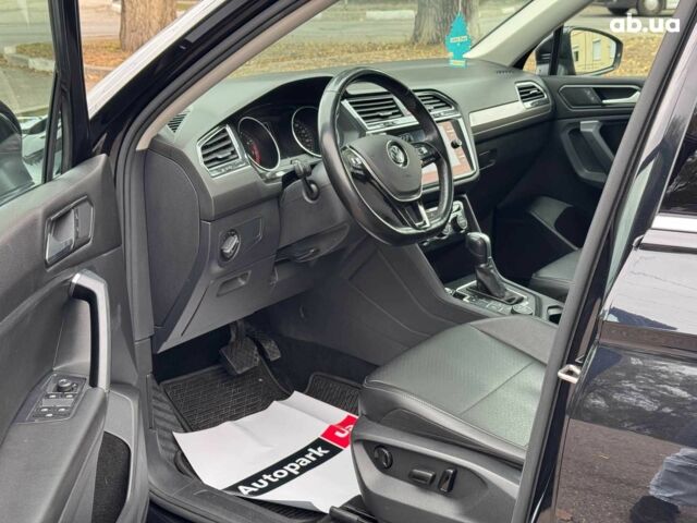 Черный Фольксваген Тигуан, объемом двигателя 2 л и пробегом 143 тыс. км за 18690 $, фото 13 на Automoto.ua