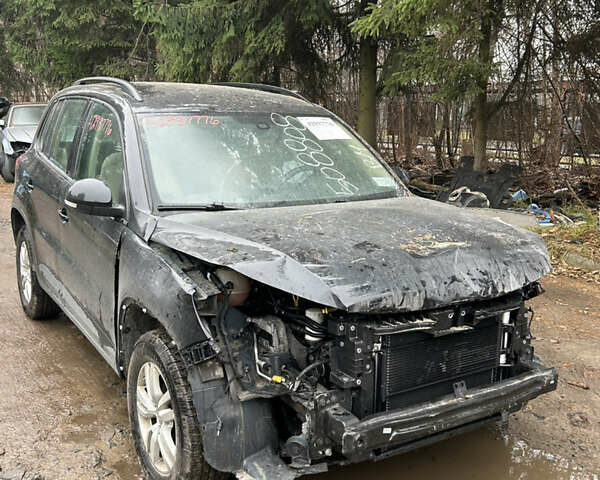 Черный Фольксваген Тигуан, объемом двигателя 1.98 л и пробегом 198 тыс. км за 8800 $, фото 1 на Automoto.ua