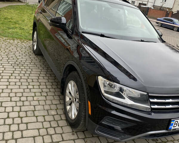 Черный Фольксваген Тигуан, объемом двигателя 1.98 л и пробегом 199 тыс. км за 15850 $, фото 1 на Automoto.ua