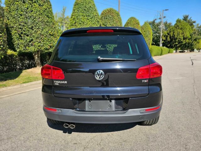 Черный Фольксваген Тигуан, объемом двигателя 2 л и пробегом 57 тыс. км за 11300 $, фото 3 на Automoto.ua