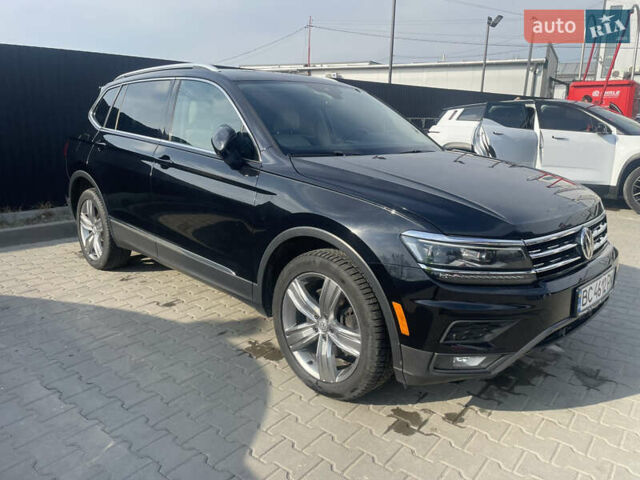 Черный Фольксваген Тигуан, объемом двигателя 1.98 л и пробегом 99 тыс. км за 23000 $, фото 5 на Automoto.ua