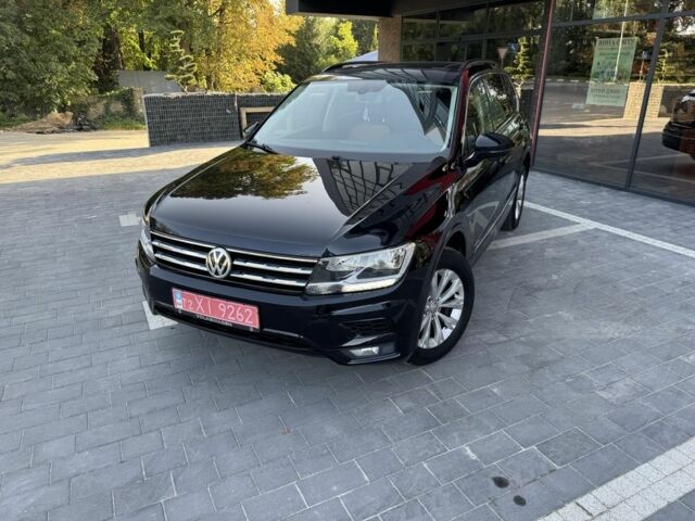 Черный Фольксваген Тигуан, объемом двигателя 2 л и пробегом 173 тыс. км за 16400 $, фото 1 на Automoto.ua