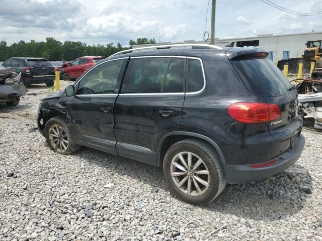 Черный Фольксваген Тигуан, объемом двигателя 2 л и пробегом 148 тыс. км за 9800 $, фото 3 на Automoto.ua