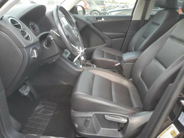 Черный Фольксваген Тигуан, объемом двигателя 2 л и пробегом 142 тыс. км за 2500 $, фото 6 на Automoto.ua