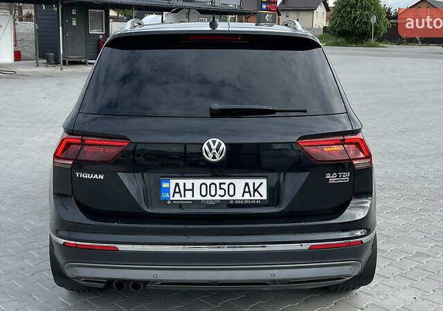 Черный Фольксваген Тигуан, объемом двигателя 1.97 л и пробегом 250 тыс. км за 23500 $, фото 19 на Automoto.ua