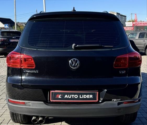 Черный Фольксваген Тигуан, объемом двигателя 2 л и пробегом 183 тыс. км за 14000 $, фото 4 на Automoto.ua