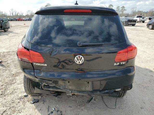 Чорний Фольксваген Тігуан, об'ємом двигуна 2 л та пробігом 150 тис. км за 8600 $, фото 4 на Automoto.ua