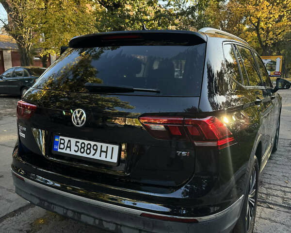 Чорний Фольксваген Тігуан, об'ємом двигуна 1.98 л та пробігом 127 тис. км за 22000 $, фото 2 на Automoto.ua