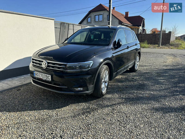 Черный Фольксваген Тигуан, объемом двигателя 1.97 л и пробегом 235 тыс. км за 21000 $, фото 1 на Automoto.ua