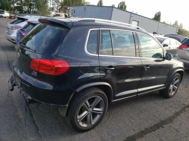 Черный Фольксваген Тигуан, объемом двигателя 2 л и пробегом 118 тыс. км за 2500 $, фото 2 на Automoto.ua