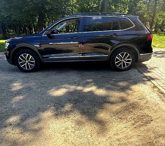 Черный Фольксваген Тигуан, объемом двигателя 2 л и пробегом 176 тыс. км за 17000 $, фото 4 на Automoto.ua