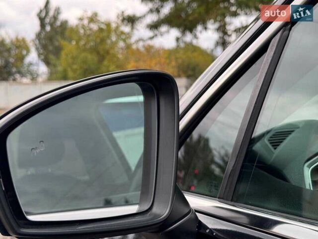 Чорний Фольксваген Тігуан, об'ємом двигуна 2 л та пробігом 143 тис. км за 18690 $, фото 12 на Automoto.ua