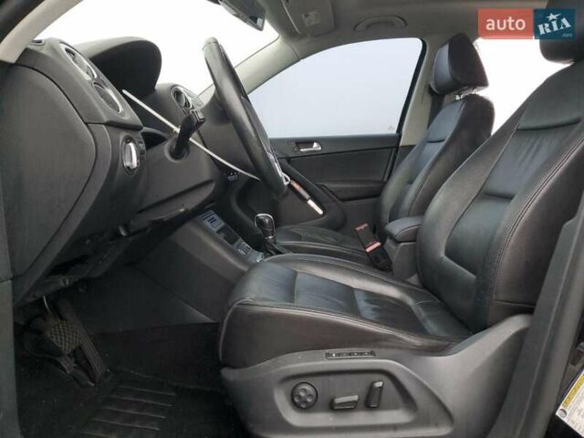 Черный Фольксваген Тигуан, объемом двигателя 1.98 л и пробегом 65 тыс. км за 650 $, фото 6 на Automoto.ua