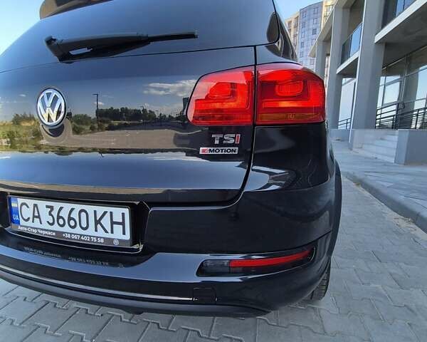Чорний Фольксваген Тігуан, об'ємом двигуна 1.98 л та пробігом 117 тис. км за 17890 $, фото 1 на Automoto.ua