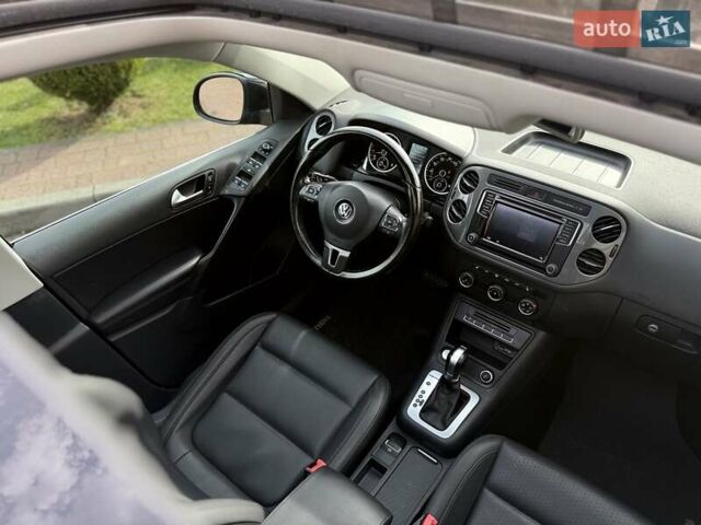 Черный Фольксваген Тигуан, объемом двигателя 1.98 л и пробегом 122 тыс. км за 14900 $, фото 2 на Automoto.ua