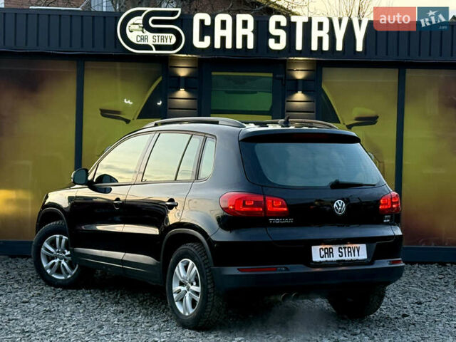 Черный Фольксваген Тигуан, объемом двигателя 2 л и пробегом 185 тыс. км за 13999 $, фото 2 на Automoto.ua