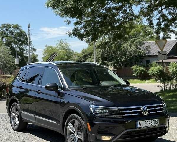 Черный Фольксваген Тигуан, объемом двигателя 2 л и пробегом 145 тыс. км за 19700 $, фото 6 на Automoto.ua