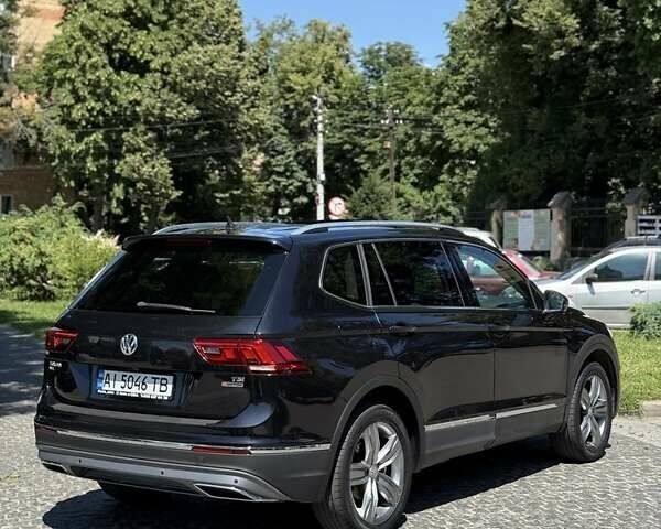Черный Фольксваген Тигуан, объемом двигателя 2 л и пробегом 145 тыс. км за 19700 $, фото 4 на Automoto.ua