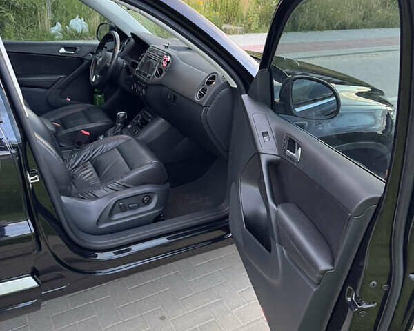 Чорний Фольксваген Тігуан, об'ємом двигуна 2 л та пробігом 117 тис. км за 15800 $, фото 19 на Automoto.ua