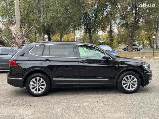 Черный Фольксваген Тигуан, объемом двигателя 2 л и пробегом 143 тыс. км за 18690 $, фото 5 на Automoto.ua