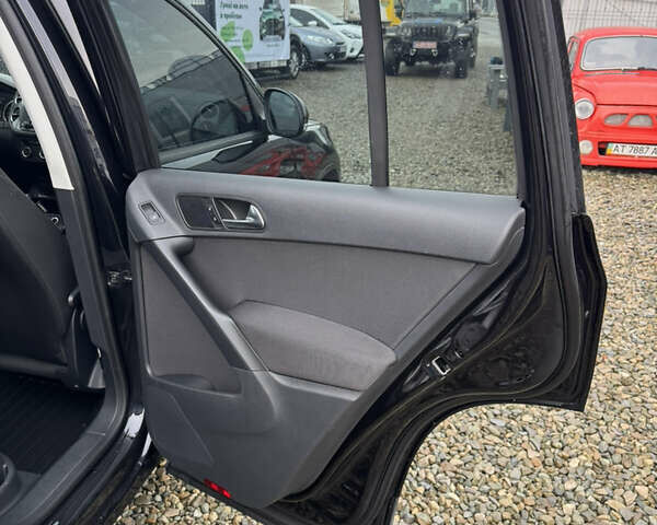 Черный Фольксваген Тигуан, объемом двигателя 2 л и пробегом 140 тыс. км за 13700 $, фото 27 на Automoto.ua