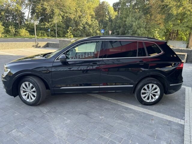 Черный Фольксваген Тигуан, объемом двигателя 2 л и пробегом 173 тыс. км за 16400 $, фото 4 на Automoto.ua