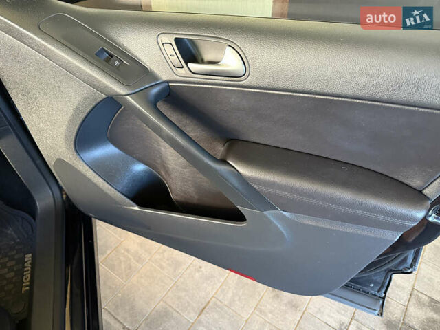 Черный Фольксваген Тигуан, объемом двигателя 1.98 л и пробегом 161 тыс. км за 14300 $, фото 23 на Automoto.ua