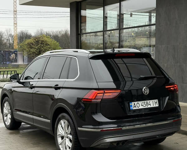Черный Фольксваген Тигуан, объемом двигателя 2 л и пробегом 209 тыс. км за 23800 $, фото 10 на Automoto.ua