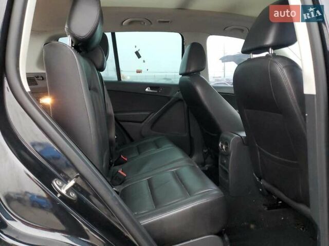 Черный Фольксваген Тигуан, объемом двигателя 1.98 л и пробегом 65 тыс. км за 650 $, фото 10 на Automoto.ua