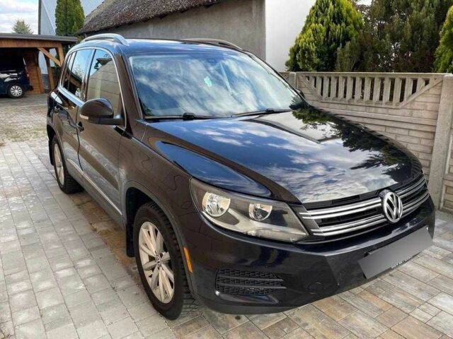 Чорний Фольксваген Тігуан, об'ємом двигуна 2 л та пробігом 153 тис. км за 12000 $, фото 1 на Automoto.ua