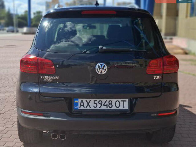 Черный Фольксваген Тигуан, объемом двигателя 1.98 л и пробегом 118 тыс. км за 16800 $, фото 2 на Automoto.ua