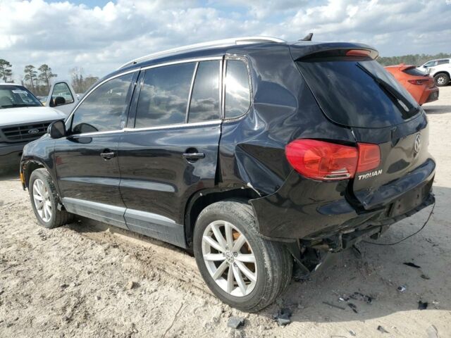 Чорний Фольксваген Тігуан, об'ємом двигуна 2 л та пробігом 150 тис. км за 8600 $, фото 3 на Automoto.ua