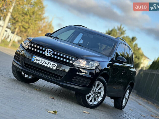 Черный Фольксваген Тигуан, объемом двигателя 2 л и пробегом 100 тыс. км за 14200 $, фото 1 на Automoto.ua