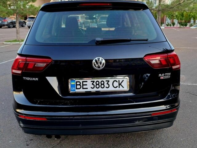 Чорний Фольксваген Тігуан, об'ємом двигуна 2 л та пробігом 176 тис. км за 20500 $, фото 1 на Automoto.ua