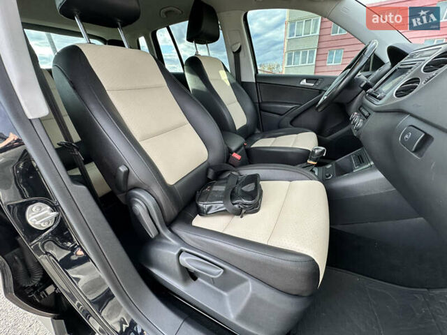 Черный Фольксваген Тигуан, объемом двигателя 2 л и пробегом 175 тыс. км за 12333 $, фото 63 на Automoto.ua