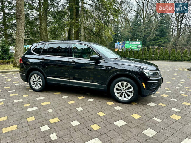Чорний Фольксваген Тігуан, об'ємом двигуна 2 л та пробігом 186 тис. км за 17300 $, фото 17 на Automoto.ua