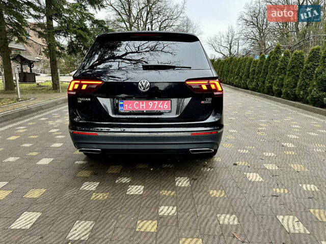 Чорний Фольксваген Тігуан, об'ємом двигуна 2 л та пробігом 186 тис. км за 17300 $, фото 12 на Automoto.ua