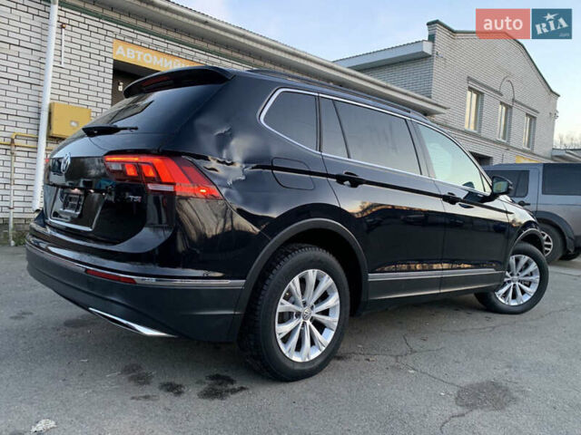 Черный Фольксваген Тигуан, объемом двигателя 2 л и пробегом 188 тыс. км за 12890 $, фото 28 на Automoto.ua