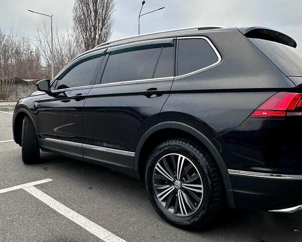 Черный Фольксваген Тигуан, объемом двигателя 1.98 л и пробегом 80 тыс. км за 25000 $, фото 26 на Automoto.ua