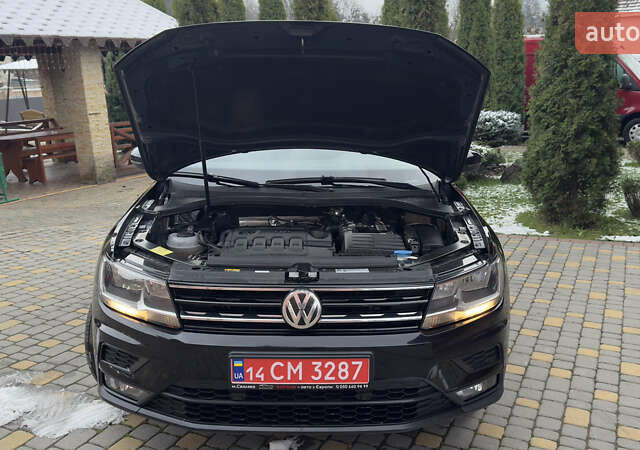 Чорний Фольксваген Тігуан, об'ємом двигуна 1.98 л та пробігом 258 тис. км за 23300 $, фото 78 на Automoto.ua