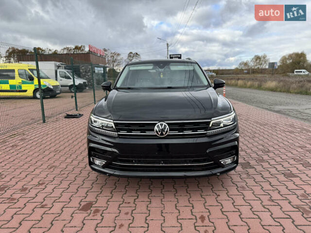 Черный Фольксваген Тигуан, объемом двигателя 1.98 л и пробегом 104 тыс. км за 19990 $, фото 1 на Automoto.ua