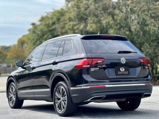 Чорний Фольксваген Тігуан, об'ємом двигуна 2 л та пробігом 37 тис. км за 4000 $, фото 4 на Automoto.ua