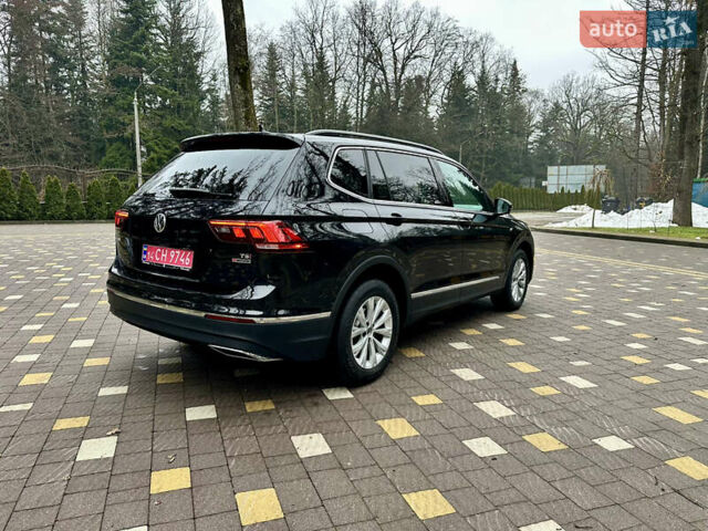 Чорний Фольксваген Тігуан, об'ємом двигуна 2 л та пробігом 186 тис. км за 17300 $, фото 18 на Automoto.ua